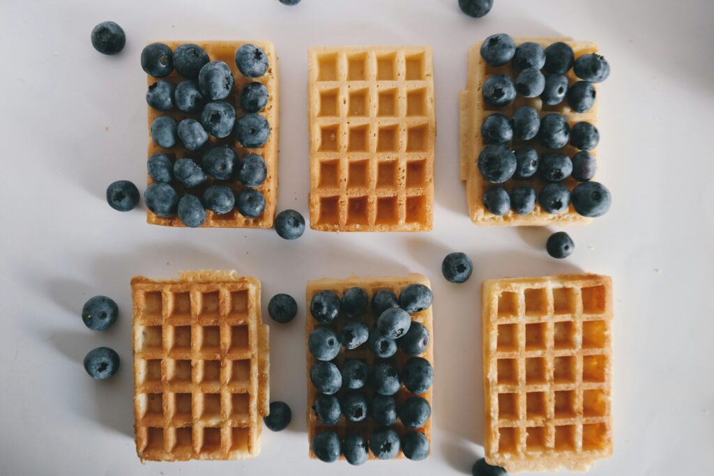 pexels-photo-131045-131045 A tempting assortment of waffles topped with fresh blueberries, perfect for a healthy breakfast.